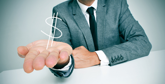 image of man in suite with a dollar sign drawn over his hand