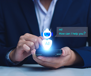 photo of a man in a suit holding a phone corresponding with an ai-powered chatbot