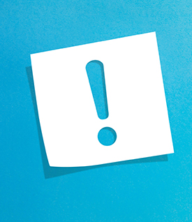 image of white paper with exclamation point cut out on blue background