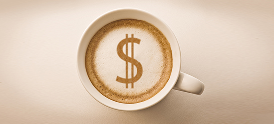 picture of coffee cup with dollar sign design in foam